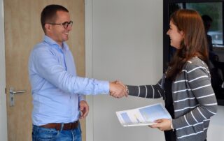 Two people shaking hands